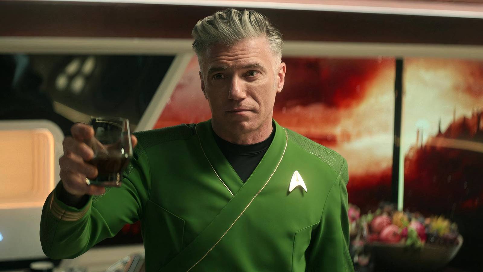 captain-pike-toasting-in-green-shiry-on-star-trek-strange-new-worlds.jpg