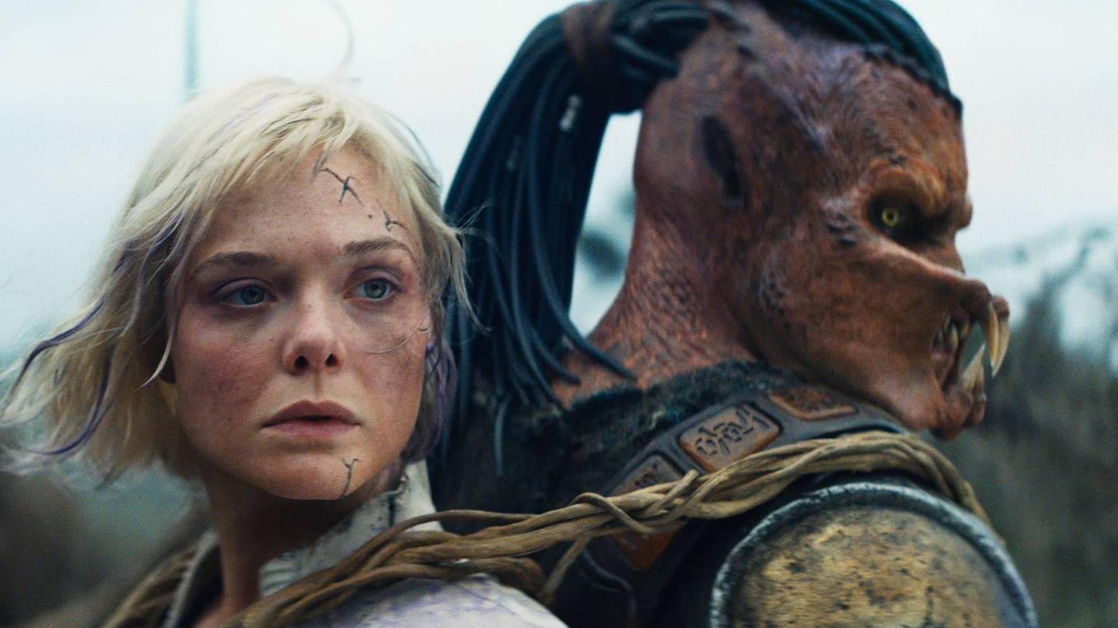 elle-fanning-thia-and-dek-in-predator-badlands.jpg