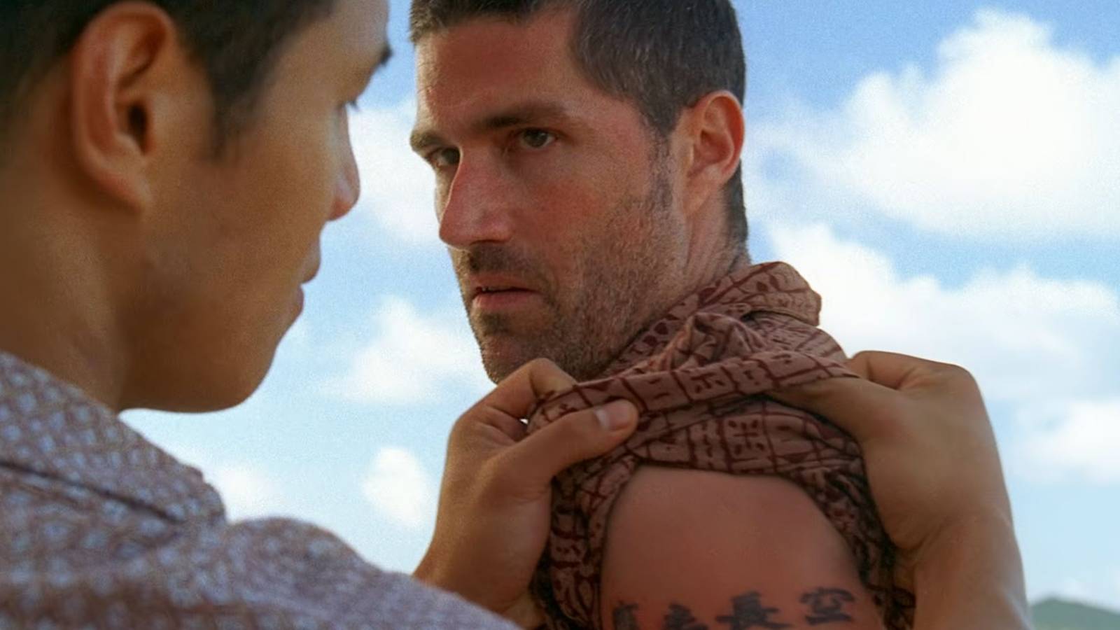 10 Frustrating Storylines Left Unresolved jack-shephard-getting-his-tattoos-scrutinized-in-lost.jpg