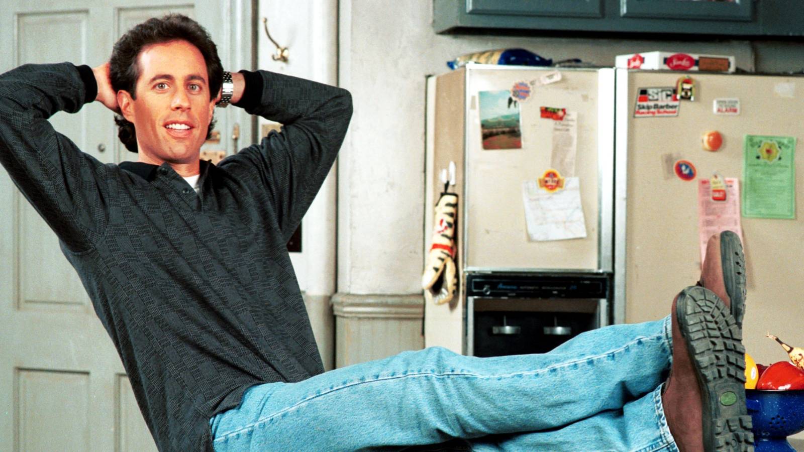 jerry-in-his-apartment-with-his-feet-up-on-his-kitchen-counter-in-seinfeld.jpg
