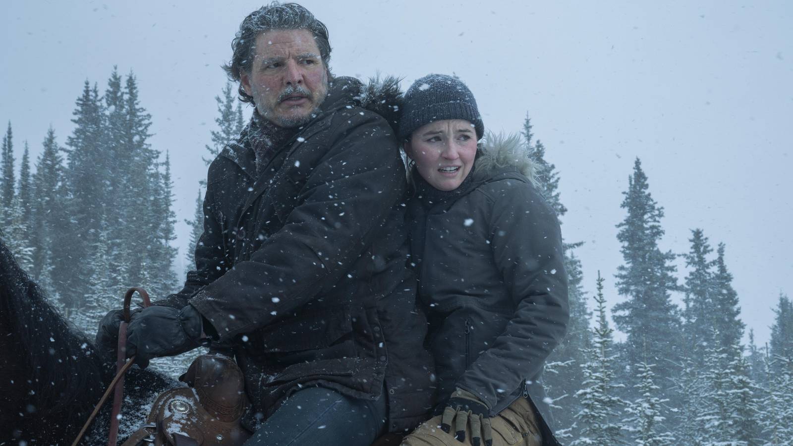 joel-and-abby-riding-a-horse-in-the-snow-in-the-last-of-us-season-2.jpg