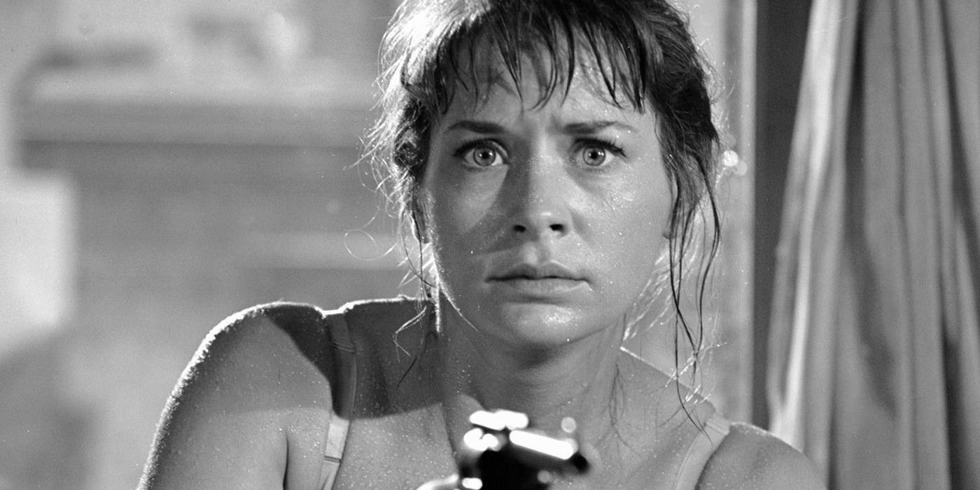 norma-holding-a-revolver-in-the-twilight-zone-s-the-midnight-sun-episode.jpg