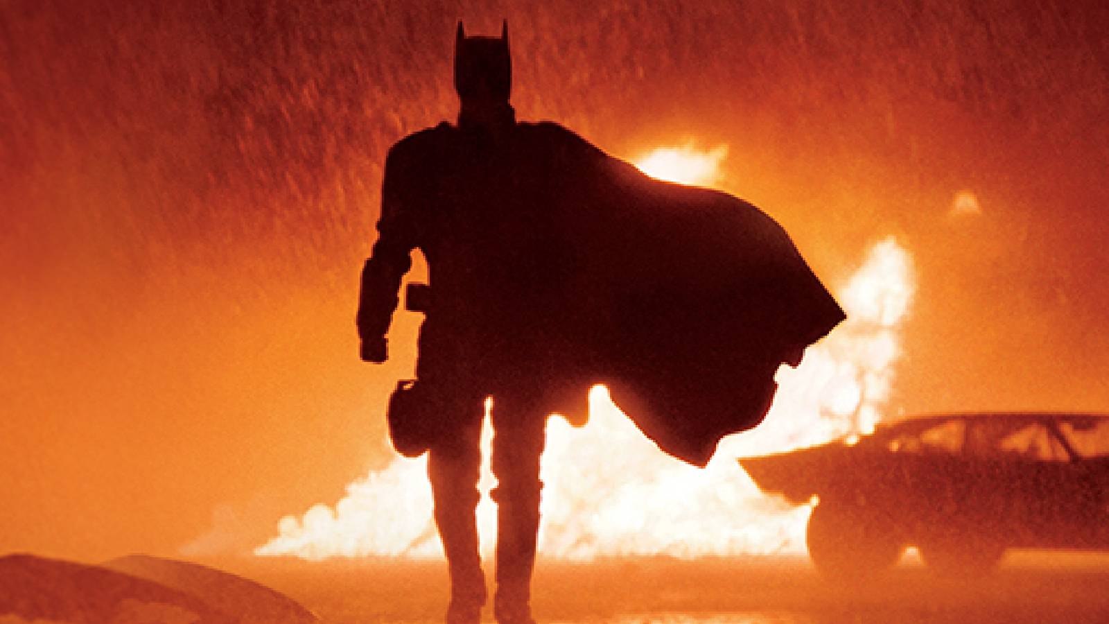 robert-pattinson-s-batman-walks-in-front-of-fire-in-the-rain-in-matt-reeves-the-batman.jpg