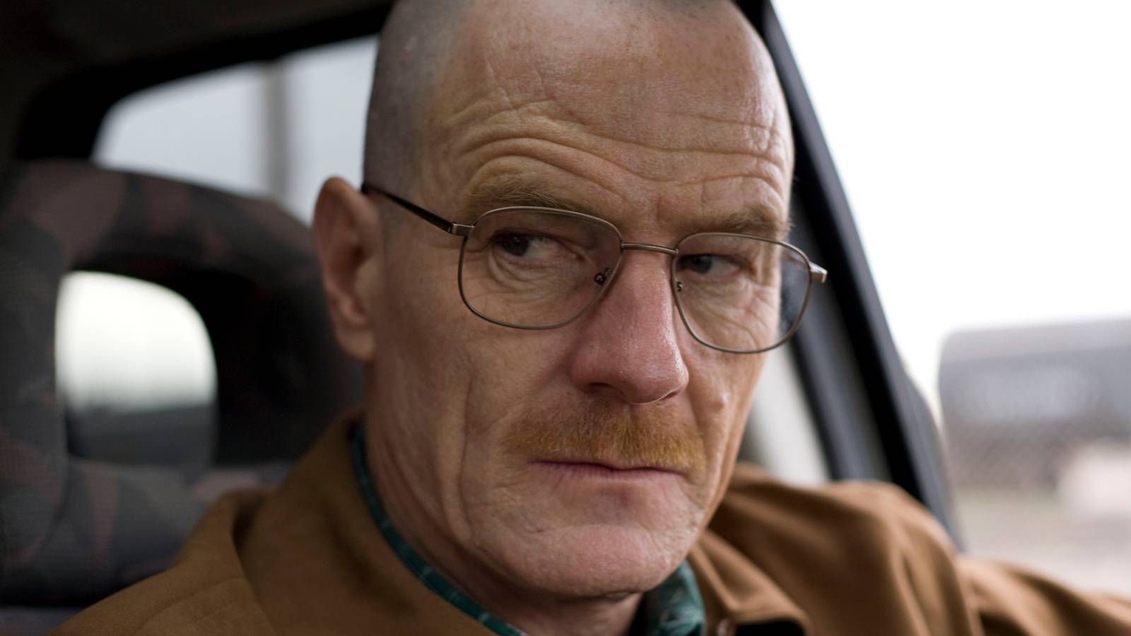 Bryan Cranston's Top 10 Breaking Bad Performances As Walter White walt-sitting-in-his-car-in-breaking-bad.jpg