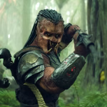 dek-holding-a-harpoon-like-weapon-on-the-forest-in-predator-badlands.jpg