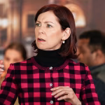 elsbeth-tascioni-carrie-preston-red-plaid-curious.jpg