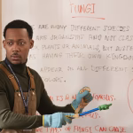tyler-james-williams-s-gregory-looks-worried-at-a-whiteboard-in-abbott-elementary.jpeg